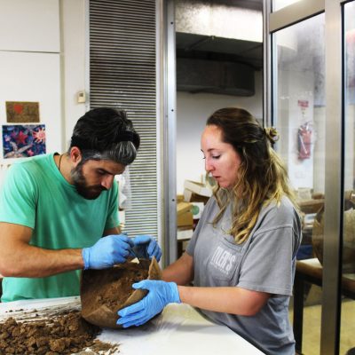 UCLA students Jacob Damm (Alan D. Leve Center scholarship recipient) and Amanda Bauer sample an early Iron Age store jar from Tel Dan’s 2018 excavations.