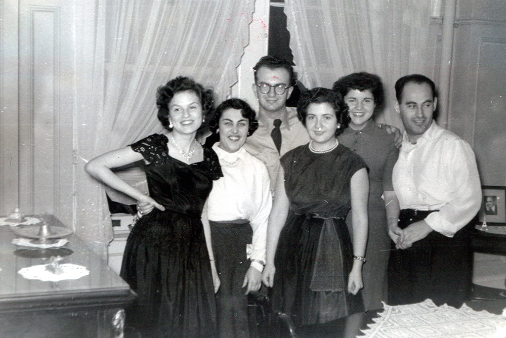 Al on leave over New Years Eve at the Stock's apartment in NYC in December 1952. Al and Rose stand second and third from the left.