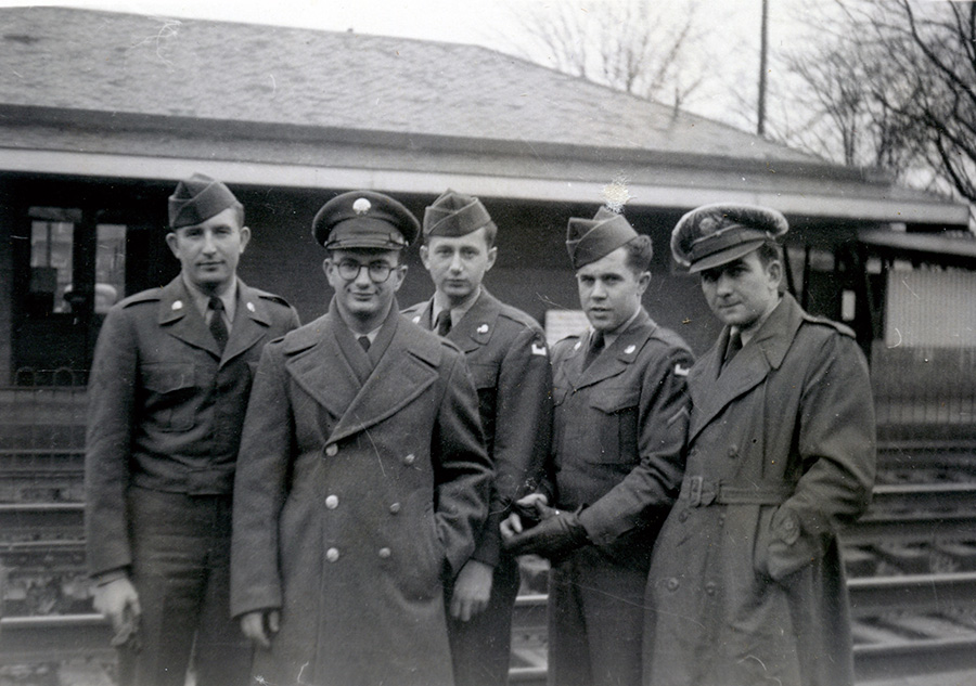 Pictured: Al (in glasses) with army friends, 1951.