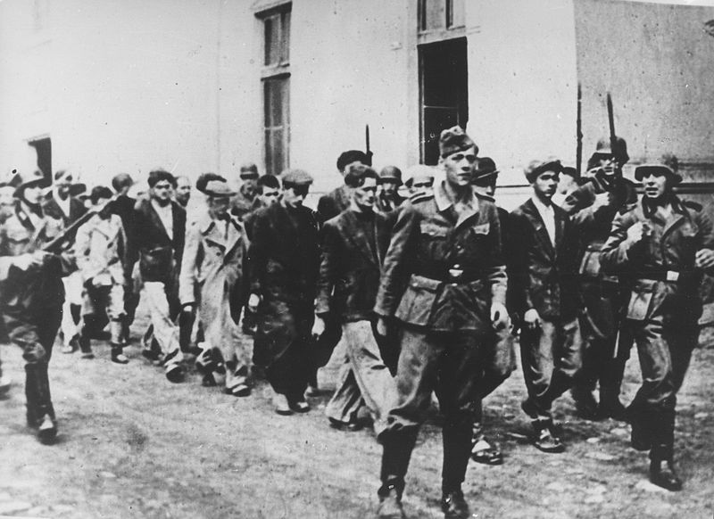 Nazis escorting those arrested in
Kragujevac, Serbia, 1941.