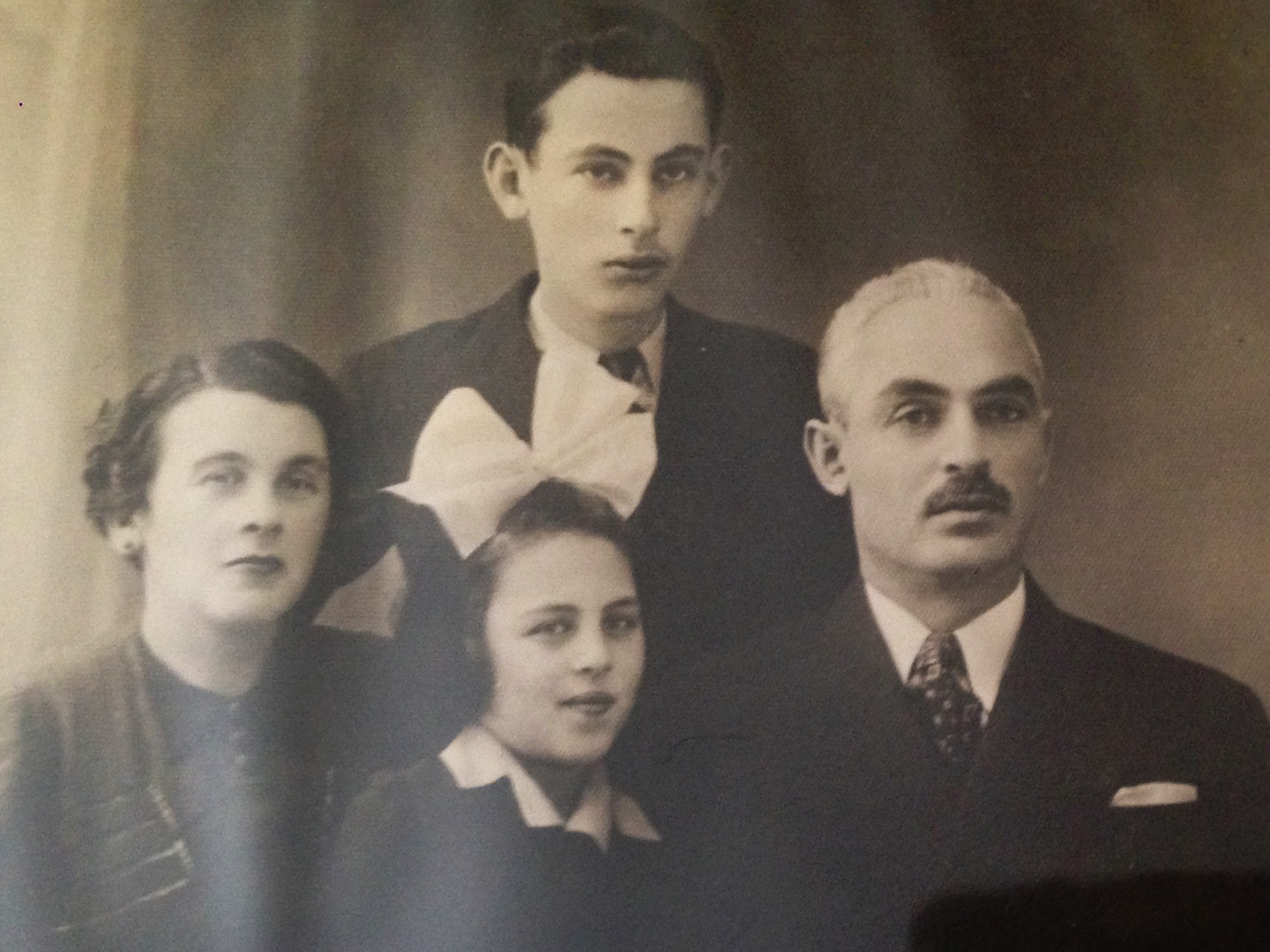 Families often spent Sundays strolling the streets of Sarajevo dressed in their finest, and photographers snapped pictures to sell. Pictured: the Stock family with Rose; her brother, Joseph; her mother, Olga; and her father, Zygmunt. 1935 in Drohobych.